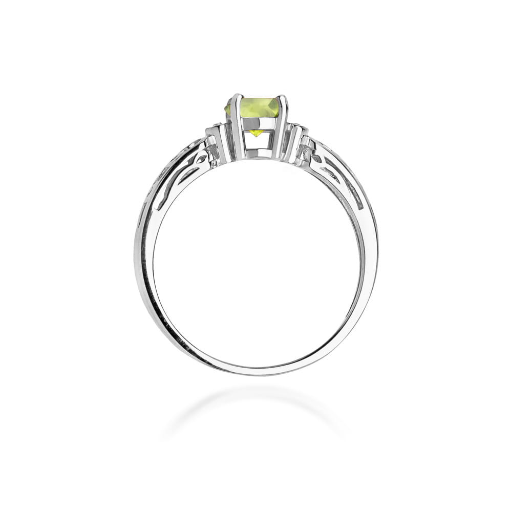 Pierścionek z oliwinem 0.60 ct i diamentami w białym złocie 585
