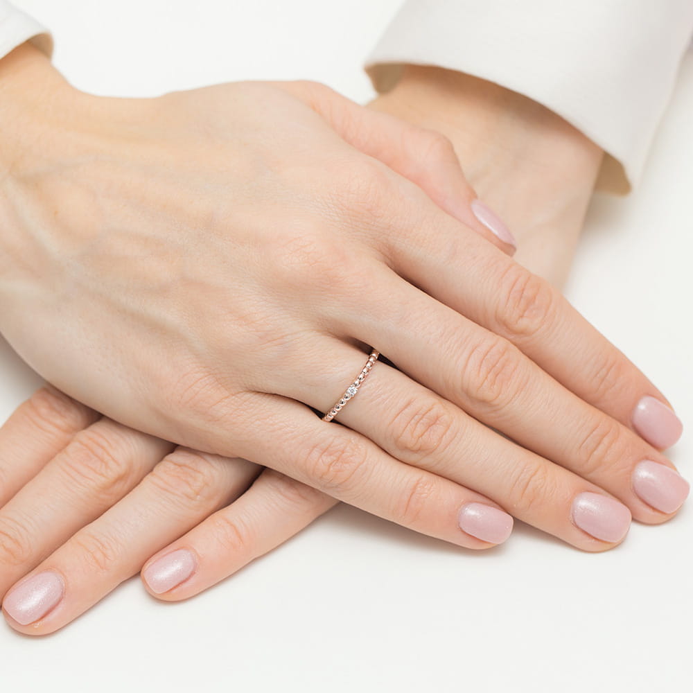 Delikatny pierścionek z diamentem 0.02 ct – złoto różowe 585