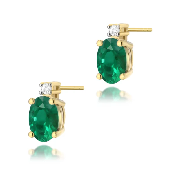 Kolczyki z owalnymi szmaragdami 2 × 0,40 ct i dwoma diamentami – żółte złoto